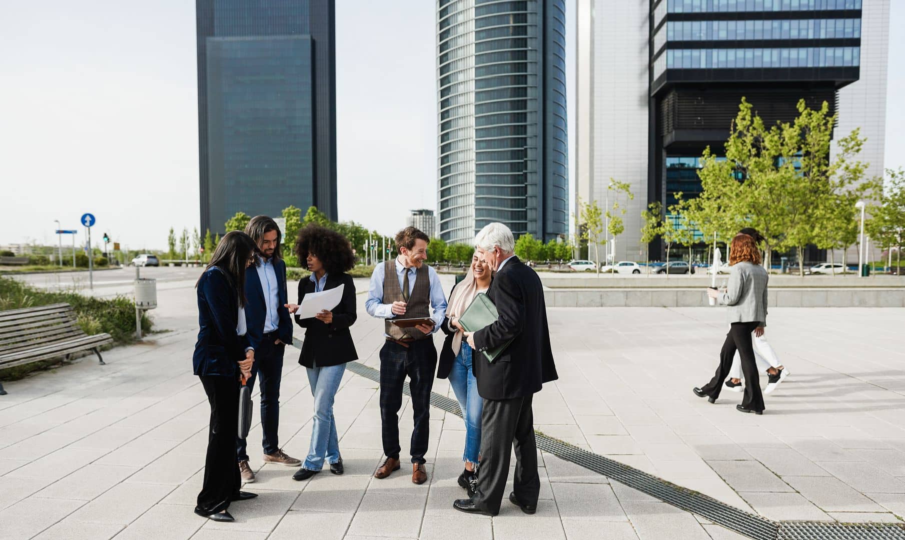 Business professionals collaborating on regional economic development strategies and location decisions