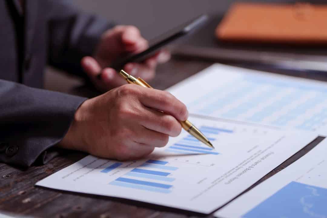 Financial charts and analysis documents showing tax credit integration and blended financing strategies for public-private partnership projects