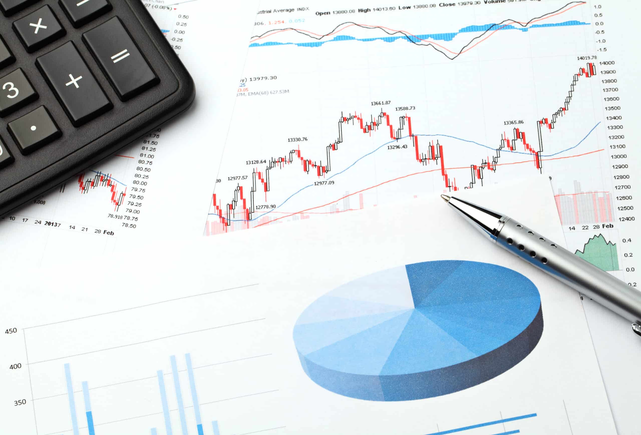 Financial charts and analysis showing investment return evaluation and risk management strategies for impact investing in economic development